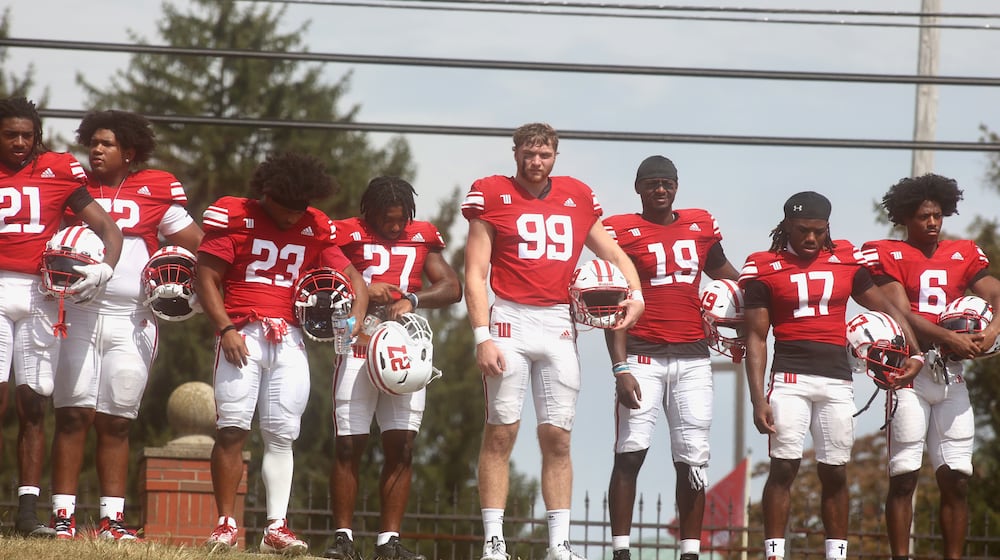 Wittenberg players stand for the national anthem before a game against Washington and Lee on Saturday, Sept. 13, 2025, at Edwards-Maurer Field in Springfield. David Jablonski/Staff