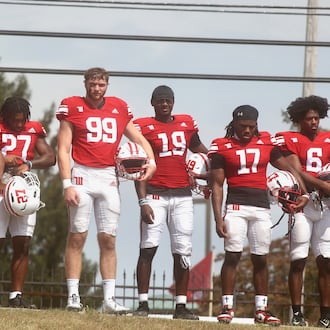 Wittenberg players stand for the national anthem before a game against Washington and Lee on Saturday, Sept. 13, 2025, at Edwards-Maurer Field in Springfield. David Jablonski/Staff