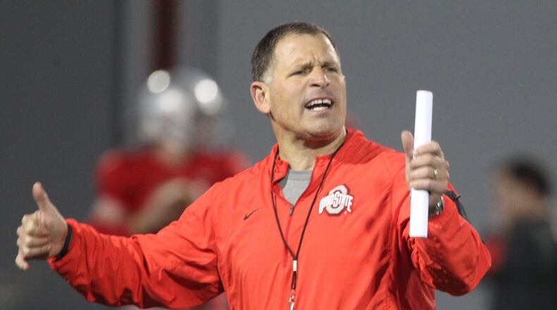 Ohio State’s Greg Schiano talks to players during spring football practice on Tuesday, March 29, 2016, at the Woody Hayes Athletic Center in Columbus. David Jablonski/Staff