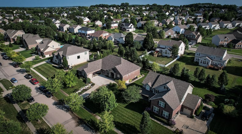Home and business owners throughout Ohio are seeking relief on property taxes, and currently, House Bill 124 is awaiting Gov. Mike DeWine's signature - a bill that gives county auditors authority to set property values instead of the state tax department. Shown here is The Settler's Walk neighborhood in Warren County, off of Ohio 741. FILE