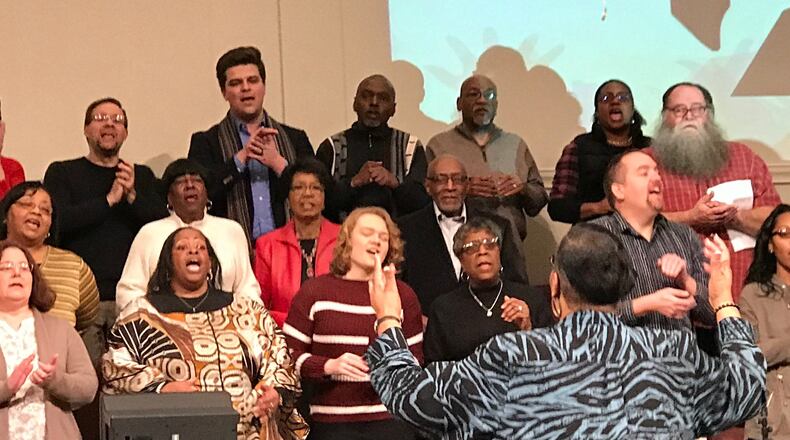 Simunye Choir performs at Celebrate Simunye, an event promoting racial reconciliation. KERMIT ROWE/CONTRIBUTOR