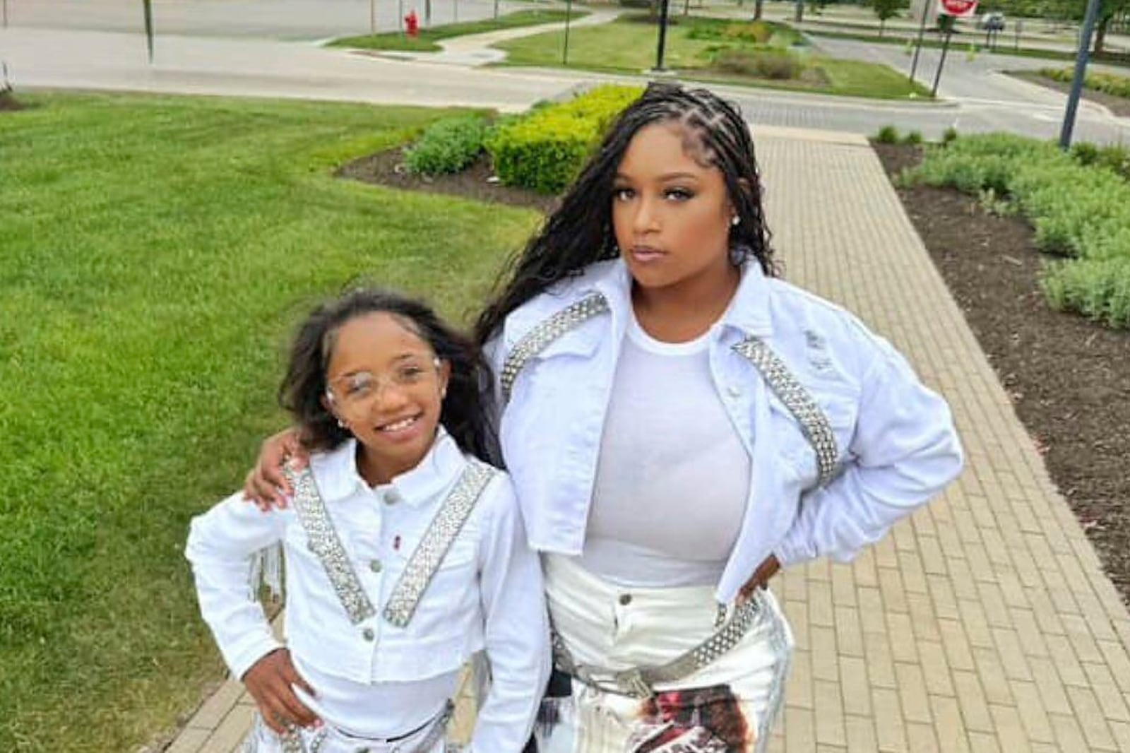 In this photo provided by Tanazha Baylis, she wears a matching outfit with Aria Brown, left, for one of Beyoncé's 'Cowboy Carter' tour performances at Soldier Field in Chicago, May 2025. (Tanazha Baylis via AP)
