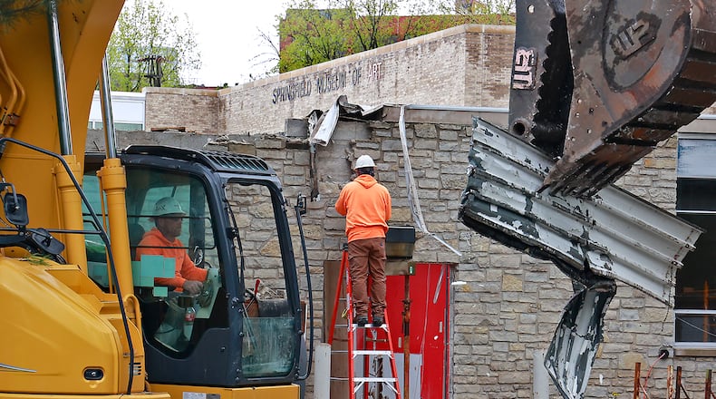 A crew from Marker Construction started demolishing the front section of the Springfield Museum of Art's old north wing Friday, April 28, 2023. The demolition is part $7 million renovation project that is expected to be complete by the end of the year. BILL LACKEY/STAFF