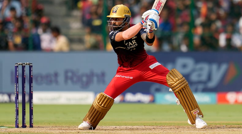 FILE - Royal Challengers Bangalore's Virat Kohli plays a shot during the Indian Premier League cricket match between Royal Challengers Bangalore and Delhi Capitals in Bengaluru, India, April 15, 2023. (AP Photo/Aijaz Rahi, File)