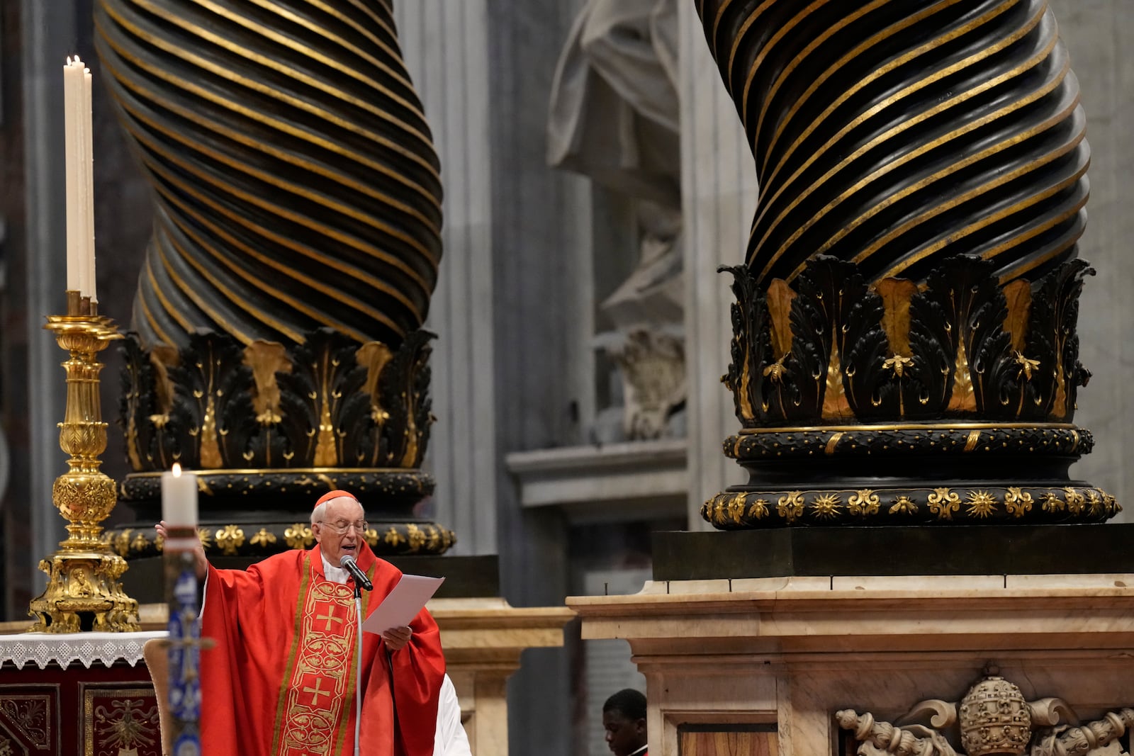 Cardinal Giovanni Battista Re celebrates a final Mass with cardinals inside St. Peter's Basilica, before the conclave to elect a new pope, at the Vatican, Wednesday, May 7, 2025. (AP Photo/Gregorio Borgia)