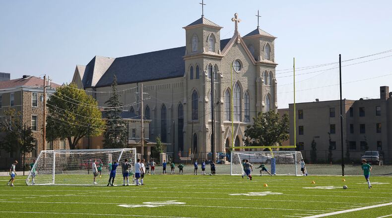 The Chaminade Julienne soccer team practices on the school's Eagle Field next to Roger Glass Stadium. Hundreds of CJ students attend the school with the benefit of EdChoice vouchers from the state. FILE PHOTO