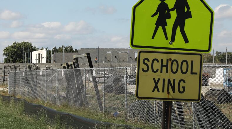 Construction continues on the new Greenon School located behind Indian Valley School Thursday. BILL LACKEY/STAFF