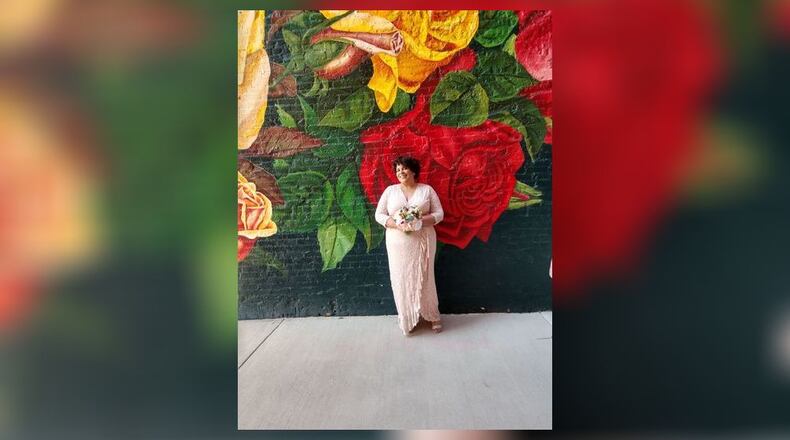 Springfield native and published author is preparing to publish her 13th novel. She is shown on her wedding day in 2020. CONTRIBUTED