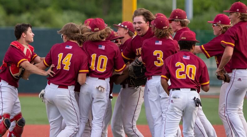 Northeastern celebrates its 6-4 victory over Cincinnati Hills Christian Academy in the Region III semifinals Thursday at Wright State.
