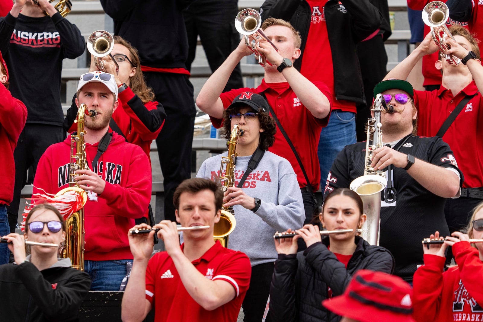Members of the Nebraska Cornhusker Marching Band perform during an NCAA college football practice Saturday, April 26, 2025, in Lincoln, Neb. (AP Photo/Dylan Widger)