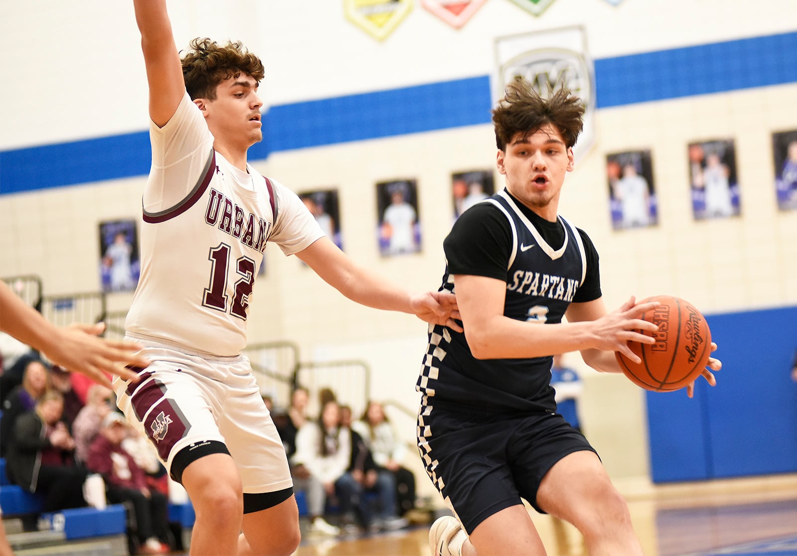 Valley View senior Adam Dickson drives past Urbana junior Kaden Underwood during their Division IV second round game on Saturday, Feb. 28 at Xenia High School. The Hillclimbers won 80-57. GEOFF NEVILLE / CONTRIBUTED PHOTO