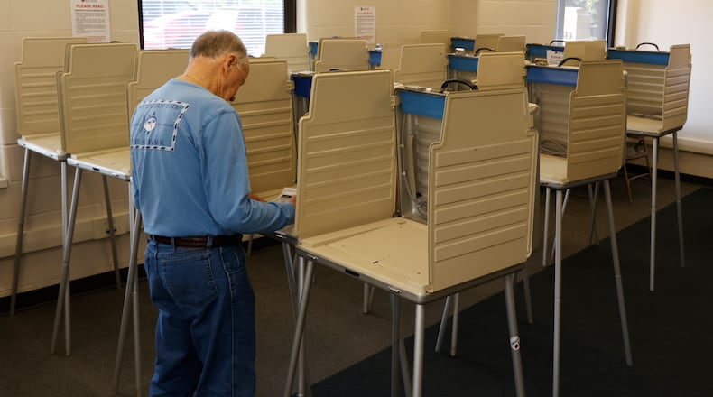 A voter fills out a ballot Friday, August 4, 2023 as he votes early at the Clark County Board of Elections. BILL LACKEY/STAFF