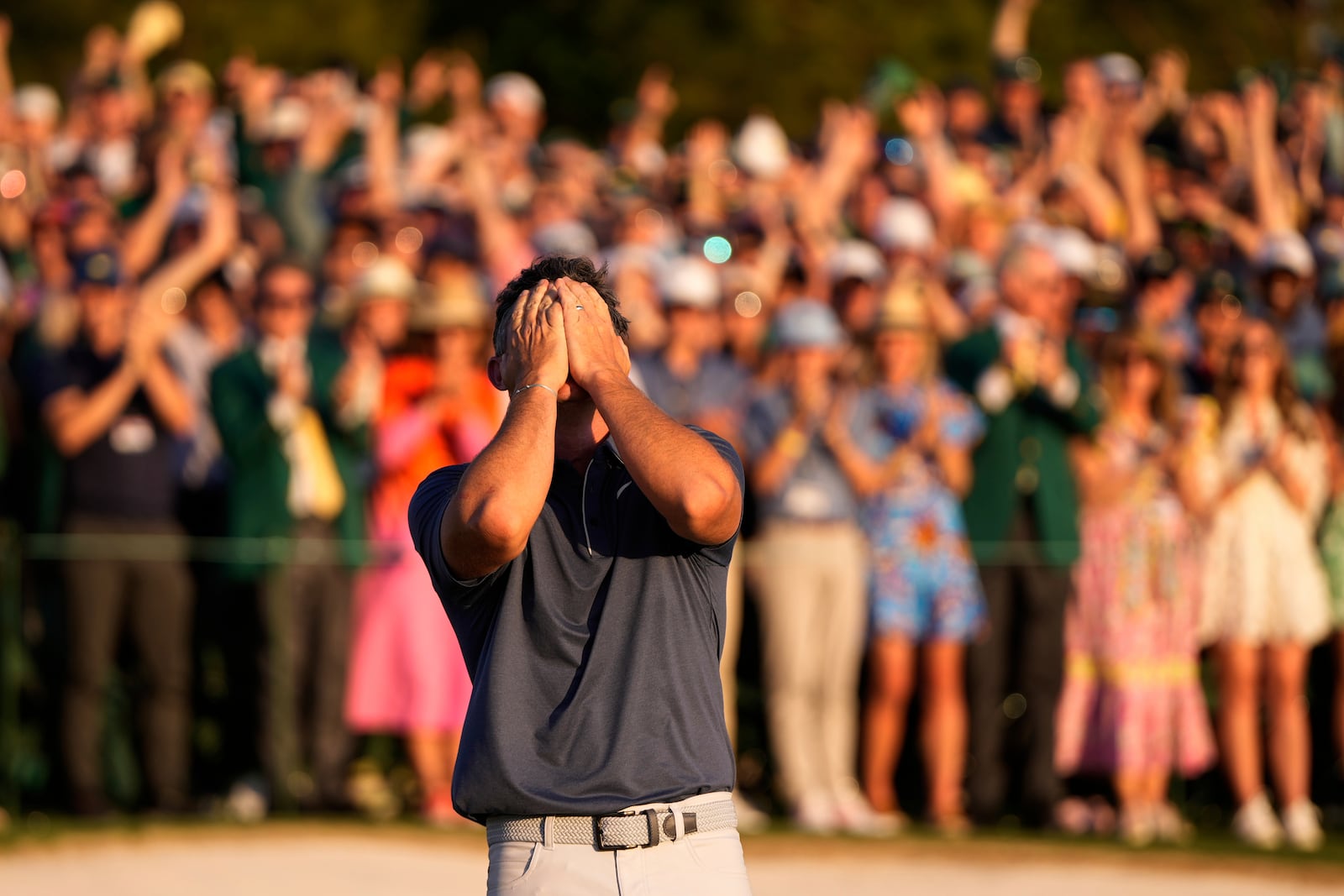 Rory McIlroy, of Northern Ireland, celebrates winning in a playoff against Justin Rose, of England, after the final round the Masters golf tournament, Sunday, April 13, 2025, in Augusta, Ga. (AP Photo/Julia Demaree Nikhinson)