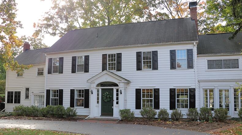 Listed for $689,000 by Sibcy Cline, the frame two-story Colonial at 3969 Applewood Lane in Kettering has about 3,738 square feet of living space, with a third-floor recreation room and a full basement with six separate rooms, an outside entrance and glass-block windows. CONTRIBUTED