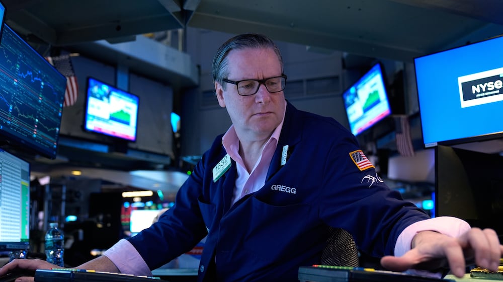 Gregg Maloney works on the floor at the New York Stock Exchange in New York, Tuesday, March 10, 2026. (AP Photo/Seth Wenig)