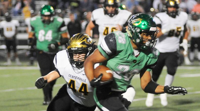 Centerville’s Max Wynn (left) closes on Northmont’s Devin Kenerly in a Week 8 GWOC crossover game last season. Wynn led the Elks with 96 total tackles in 2017. MARC PENDLETON / STAFF