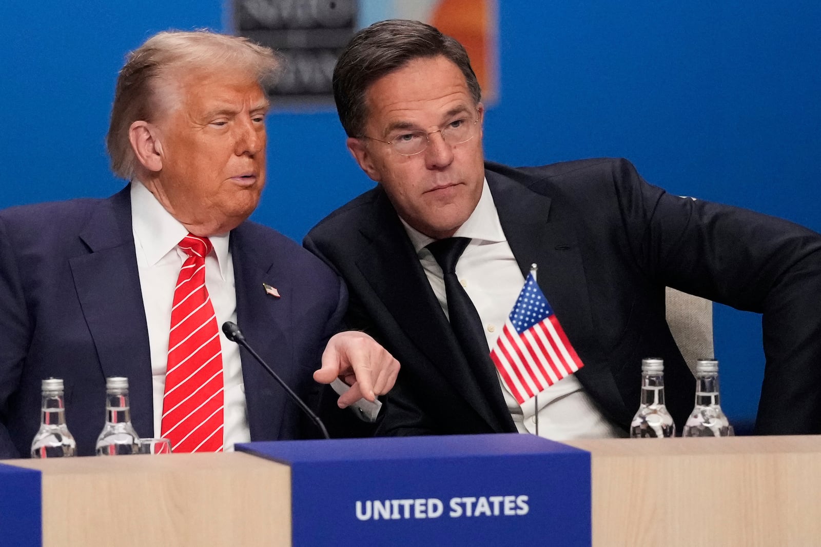 President Donald Trump and NATO Secretary General Mark Rutte attend a plenary session at the NATO summit in The Hague, Netherlands, Wednesday, June 25, 2025. (AP Photo/Matthias Schrader)