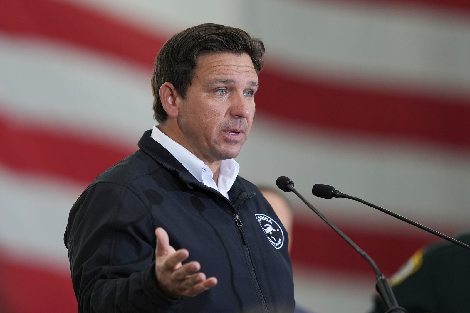 FILE - Florida Gov. Ron De Santis speaks during a press conference on immigration enforcement, at Homestead Air Force Base, Feb. 26, 2025, in Homestead, Fla. (AP Photo/Rebecca Blackwell, File)