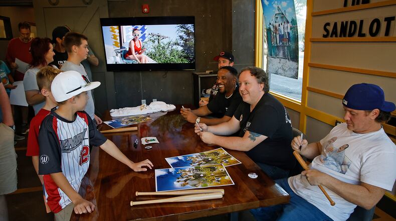 Four members from the cast of The Sandlot were in Springfield Friday, Sept. 22, 2023. The foursome, from left, Victor DiMattia, Brandon Adams, Shane Obedzinski and Tom Guiry stopped at the Springfield COhatch to sign autographs. The child stars were participating in the Stevie's World of Wiffleball charity event on Saturday. BILL LACKEY/STAFF
