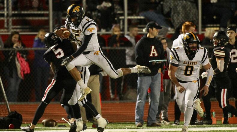 Shawnee’s Robie Glass runs against Jonathan Alder on Friday, Oct. 25, 2019, in Plain City. David Jablonski/Staff