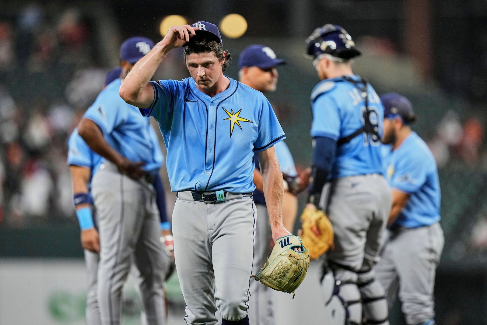 Tampa Bay Rays starter Ryan Pepiot, foreground, leaves the mound during a pitching substitution in the second inning of a baseball game against the Baltimore Orioles, Friday, June 27, 2025, in Baltimore. (AP Photo/Stephanie Scarbrough)