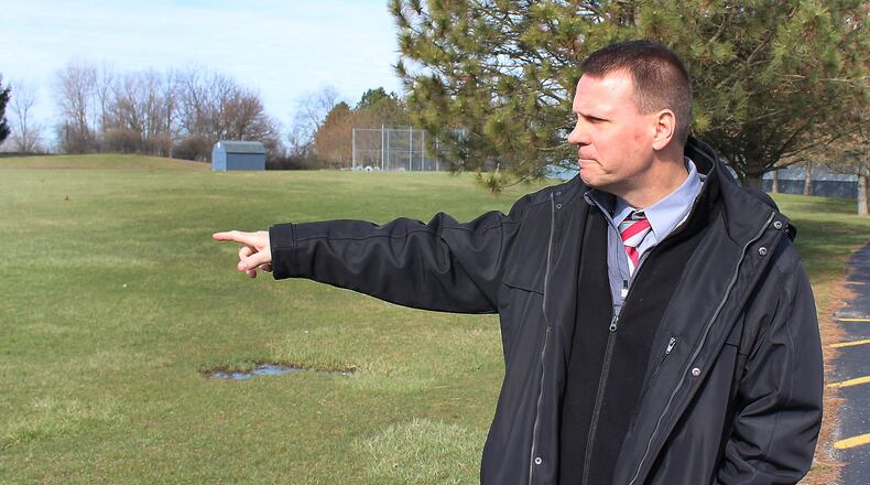 Earlier this year, Southeastern Local School superintendent, David Shea showed where the district hopes to build a new multi-purpose gymnasium near Miami View Elementary school. JEFF GUERINI/STAFF