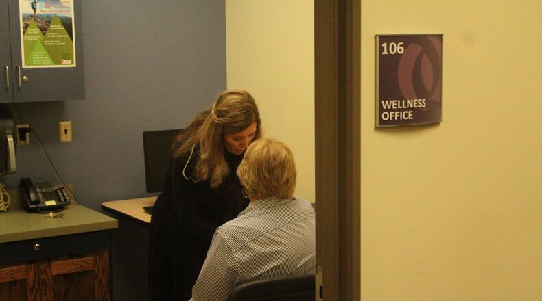 Nurse Wanda Atkins taking Leah McMaken blood pressure at United Senior Services in Springfield. DAN PASCIAK/STAFF