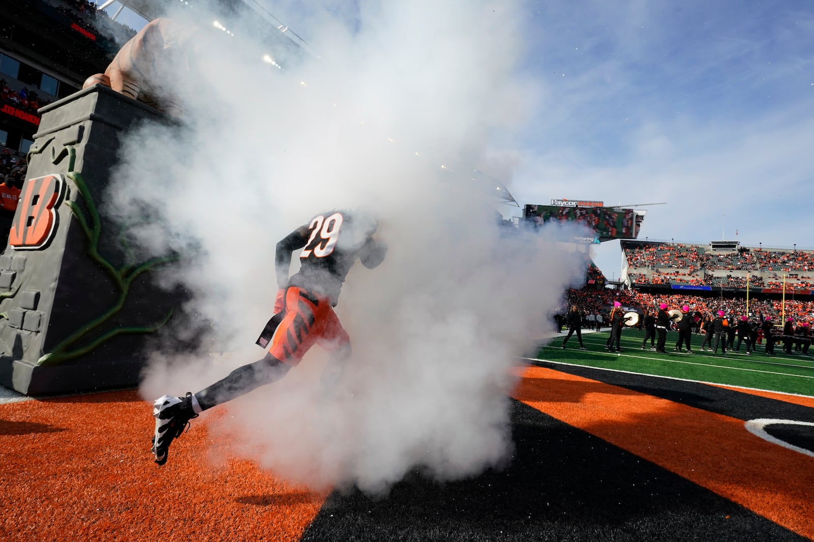 Cincinnati Bengals cornerback Cam Taylor-Britt (29) runs onto the field before an NFL football game against Cleveland Browns, Sunday, Dec. 22, 2024, in Cincinnati. (AP Photo/Jeff Dean)