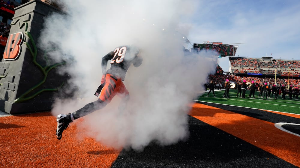 Cincinnati Bengals cornerback Cam Taylor-Britt (29) runs onto the field before an NFL football game against Cleveland Browns, Sunday, Dec. 22, 2024, in Cincinnati. (AP Photo/Jeff Dean)