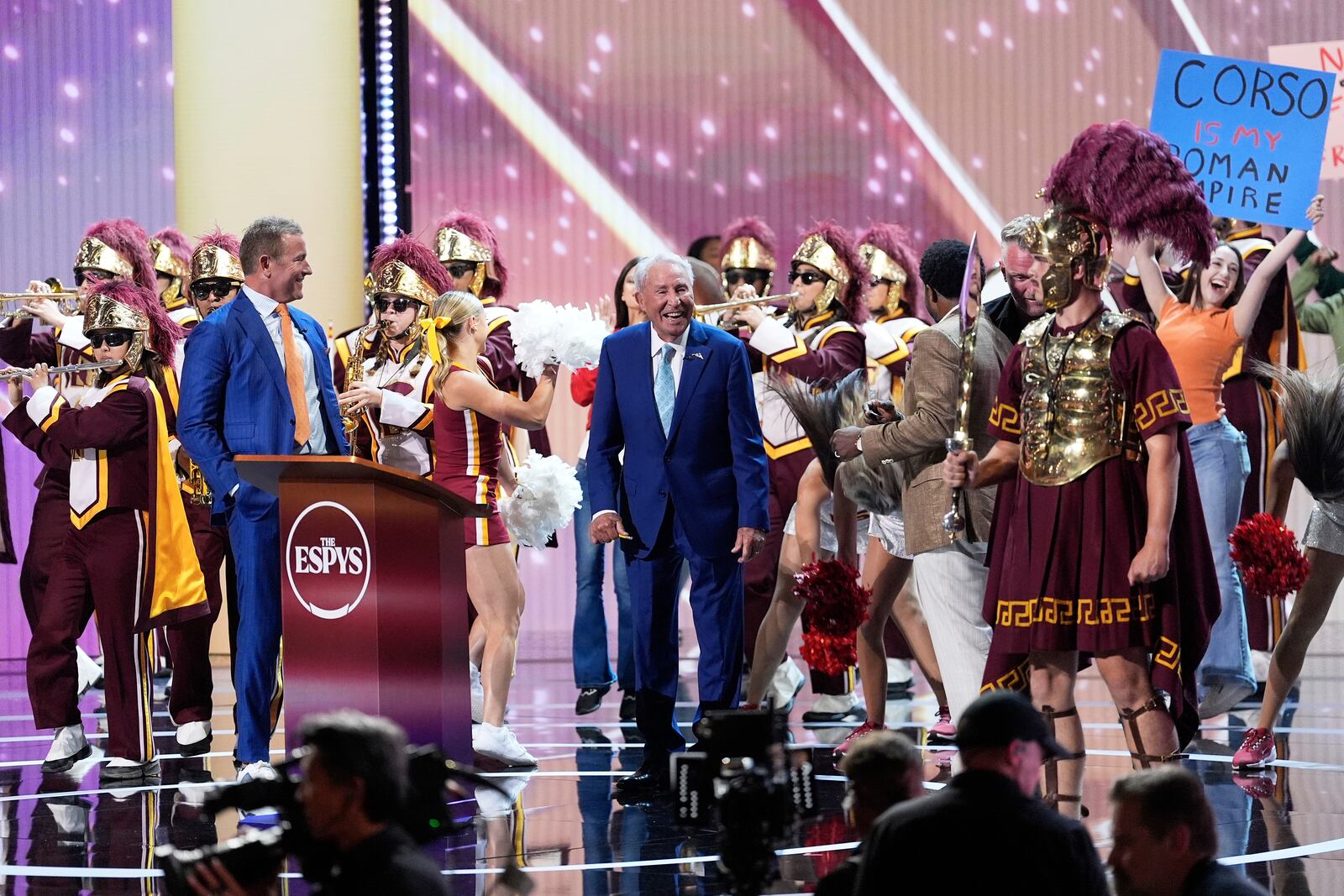 The Southern California band and cheerleaders perform as Lee Corso, middle, is honored on stage at the ESPY Awards at the Dolby Theatre in Los Angeles, Wednesday, July 16, 2025. (AP Photo/Mark J. Terrill)