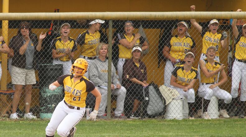 Kenton Ridge’s Lexee Trainer rounds first after a hit against Northwestern in a Division II sectional final on Wednesday, May 16, 2018, at Shawnee High School in Springfield. David Jablonski/Staff