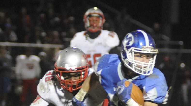 Miamisburg RB Tony Clark. Lima Senior defeated host Miamisburg 44-42 in OT in the D-II, Region 6 high school football playoffs first round that also was the final varsity football game at historic Harmon Field on Friday, Nov. 6, 2015. MARC PENDLETON / STAFF