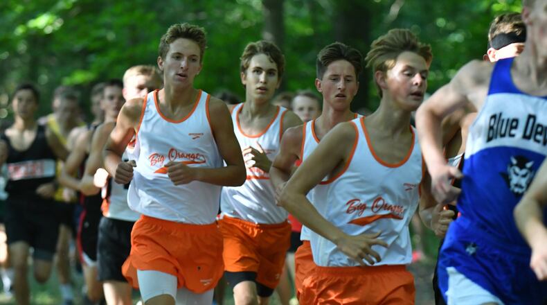 West Liberty-Salem’s boys cross country team, including (left to right) Josh Spinner, Tate Yoder, Noah Smith and Dylan Lauck, have the Big Orange ranked No. 5 in the Division II state poll. Greg Billing / Contributed