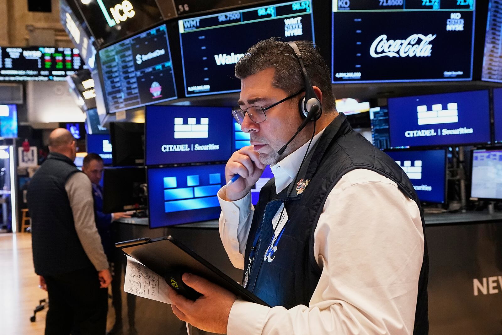 Trader Michael Capolino works on the floor of the New York Stock Exchange, Monday, May 5, 2025. (AP Photo/Richard Drew)