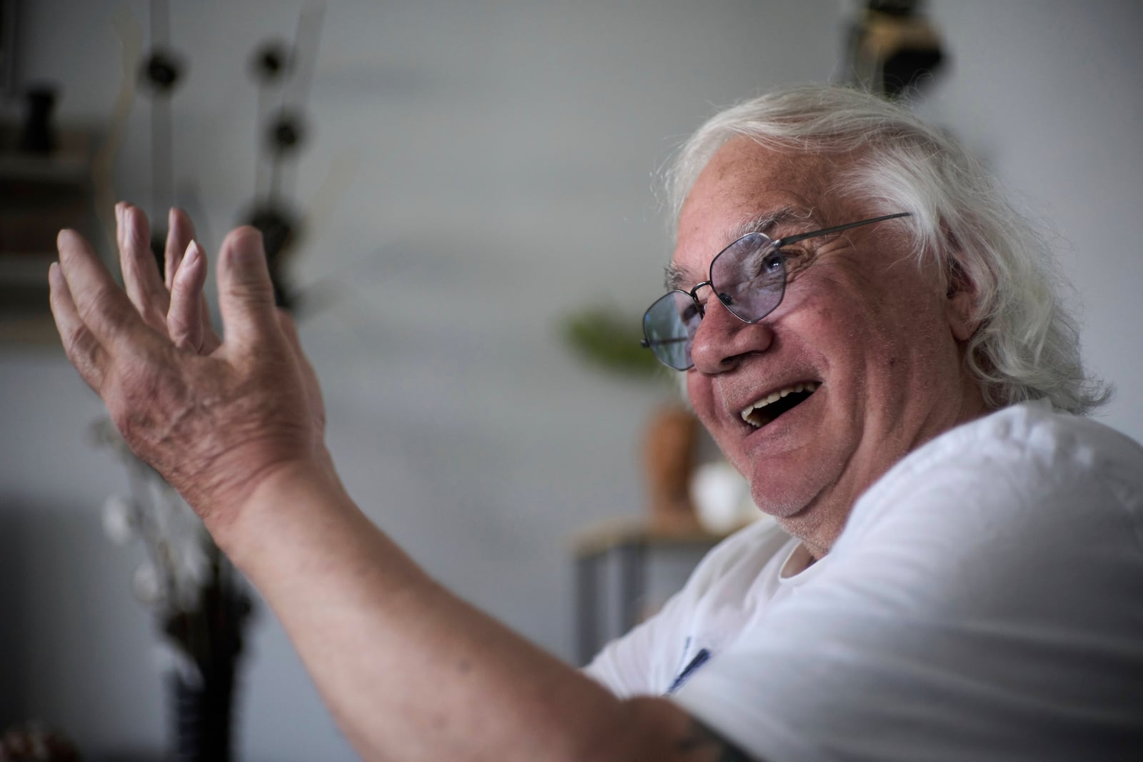 Ben Buitenhuis, a 83-year-old surivor of the 1944-1945 Hunger Winter, reacts during an interview in Delft, Netherlands, Tuesday, April 29, 2025. (AP Photo/Peter Dejong)