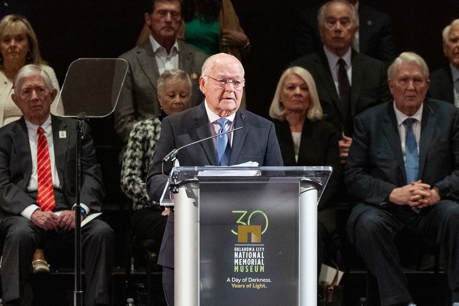 Former Oklahoma City Mayor Ron Norick, reads the Oklahoma City Memorial Mission Statement and leads guest in 168 Seconds of Silence during the 30th anniversary memorial service for the victims of the 1995 Oklahoma City bombing, in Oklahoma City, Saturday, April 19, 2025. (AP Photo/Alonzo Adams)