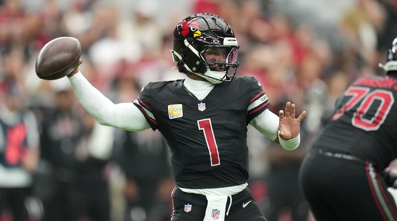 FILE - Arizona Cardinals quarterback Kyler Murray (1) throws a pass during the first half of an NFL football game against the Tennessee Titans, Oct. 5, 2025, in Glendale, Ariz. (AP Photo/Rick Scuteri, File)