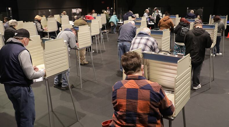 Most of the voting booths were full Wednesday, Oct. 28, 2020 at the early voting site in the Clark State Performing Arts Center. BILL LACKEY/STAFF