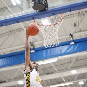 Springfield High School senior EJ Rice leaps for a dunk during their game against Fairmont on Tuesday, Jan. 6, 2026 at Springfield High School. The Firebirds won 54-46. MICHAEL COOPER / STAFF PHOTO