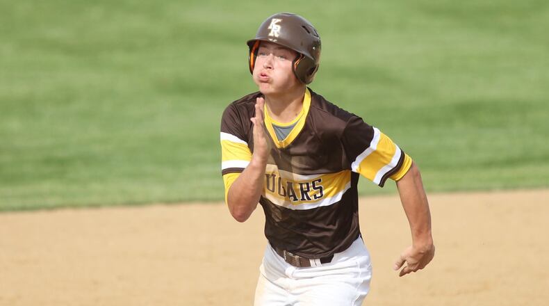 Kenton Ridge’s Calvin Dibert runs to third base against Benjamin Logan in a Division II sectional final on Thursday, May 17, 2018, in Urbana. David Jablonski/Staff