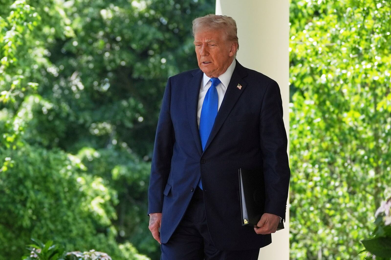 President Donald Trump arrives to speak during a National Day of Prayer event in the Rose Garden of the White House, Thursday, May 1, 2025, in Washington. (AP Photo/Evan Vucci)