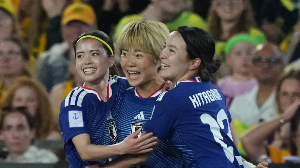 Japan's Maika Hamano, center, celebrates after scoring the first goal during the Women's Asian Cup soccer final between Japan and Australia in Sydney, Saturday, March 21, 2026. (AP Photo/Mark Baker)