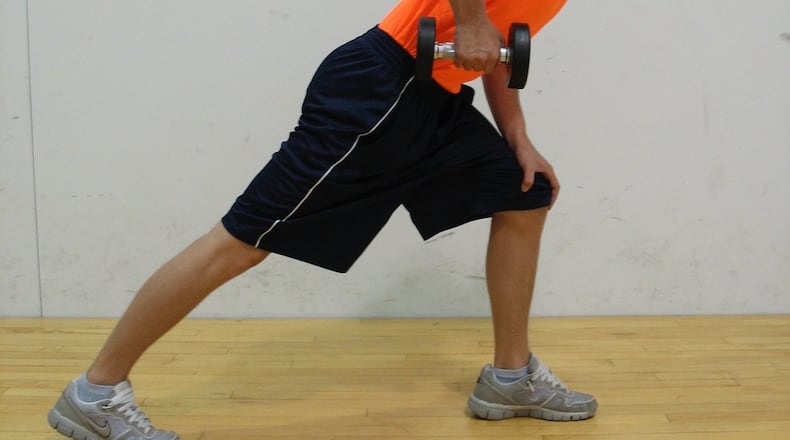Tricep Kickback: Upper arm position parallel to the floor. CONTRIBUTED