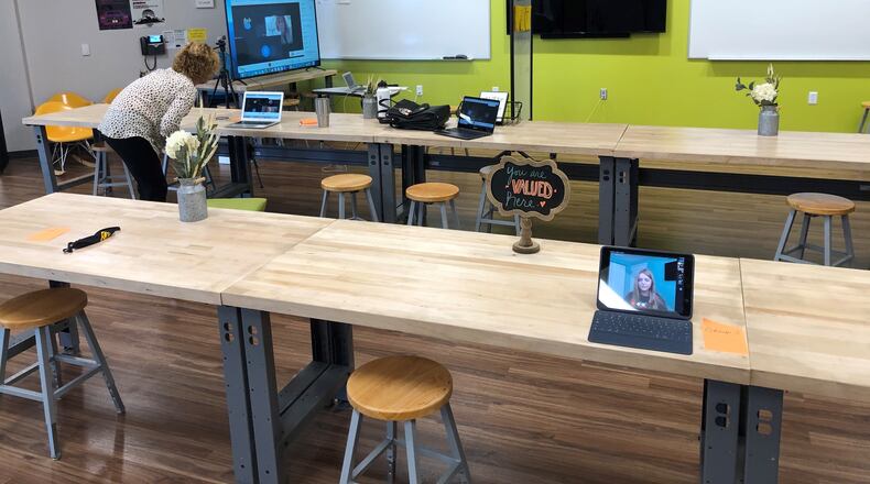 Small groups of students learning via multiple devices for health and wellness class through their current hybrid learning plan. GISA will transition to in-person learning in March. CONTRIBUTED
