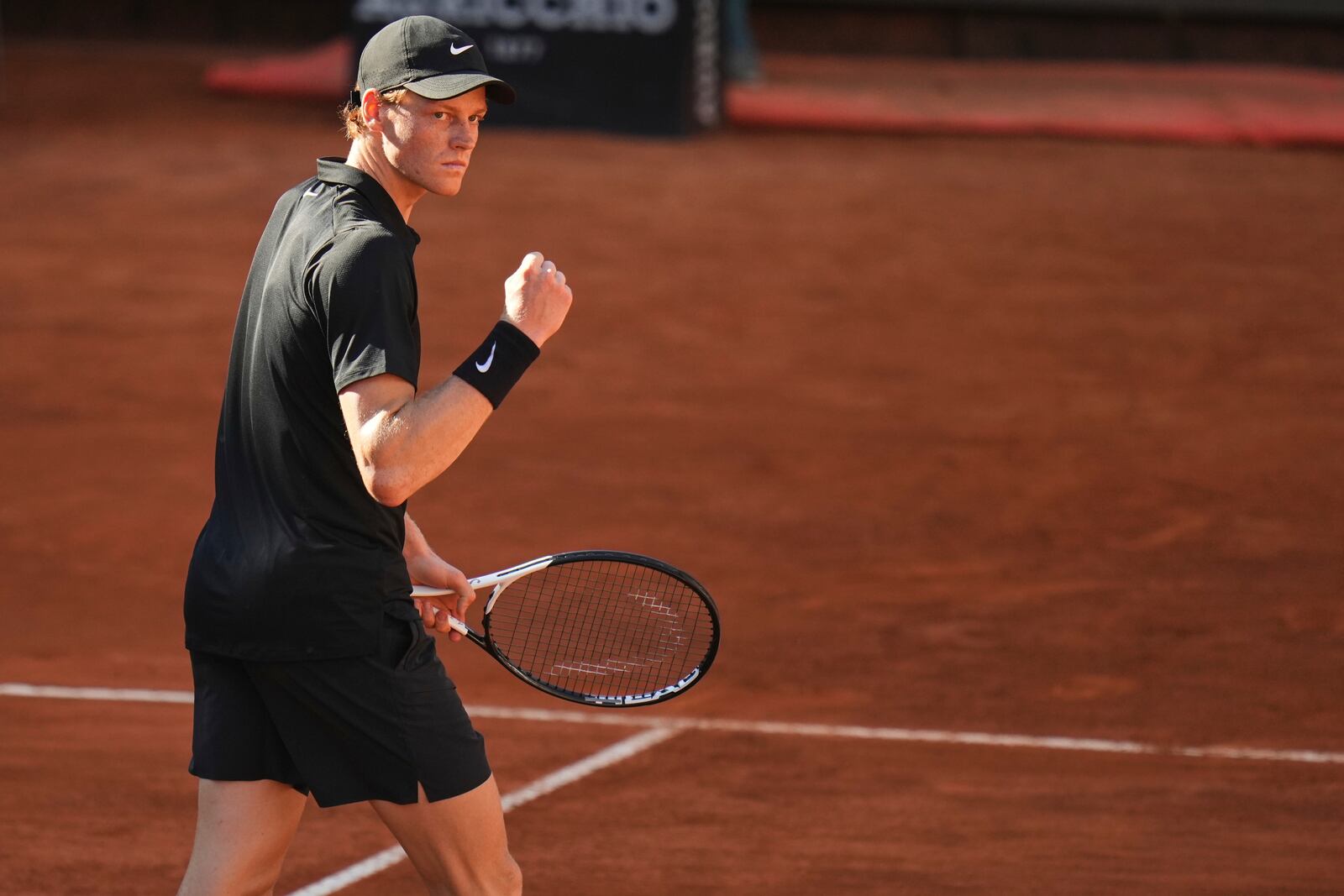 Italy's Jannik Sinner reacts after winning a point to Netherlands' Jesper De Jong during their tennis match at the Italian Open at the Foro Italico, in Rome, Monday, May 12, 2025.