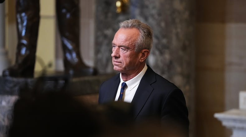 Health and Human Services Secretary Robert F. Kennedy Jr. is seen following President Donald Trump's State of the Union address to a joint session of Congress in the House chamber at the U.S. Capitol in Washington, Tuesday, Feb. 24, 2026. (AP Photo/Allison Robbert)