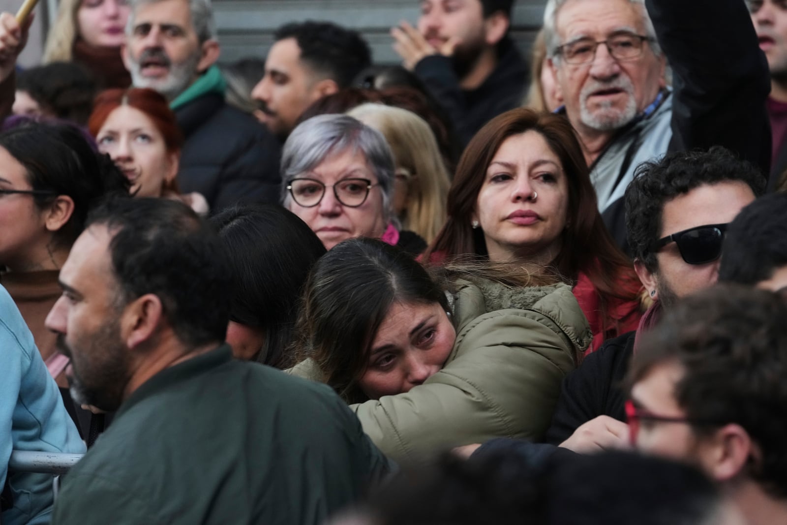 Supporters of former President Cristina Fernandez react after Argentina's Supreme Court upheld her corruption conviction, outside the Peronist Party headquarters in Buenos Aires, Argentina, Tuesday, June 10, 2025. (AP Photo/Rodrigo Abd)