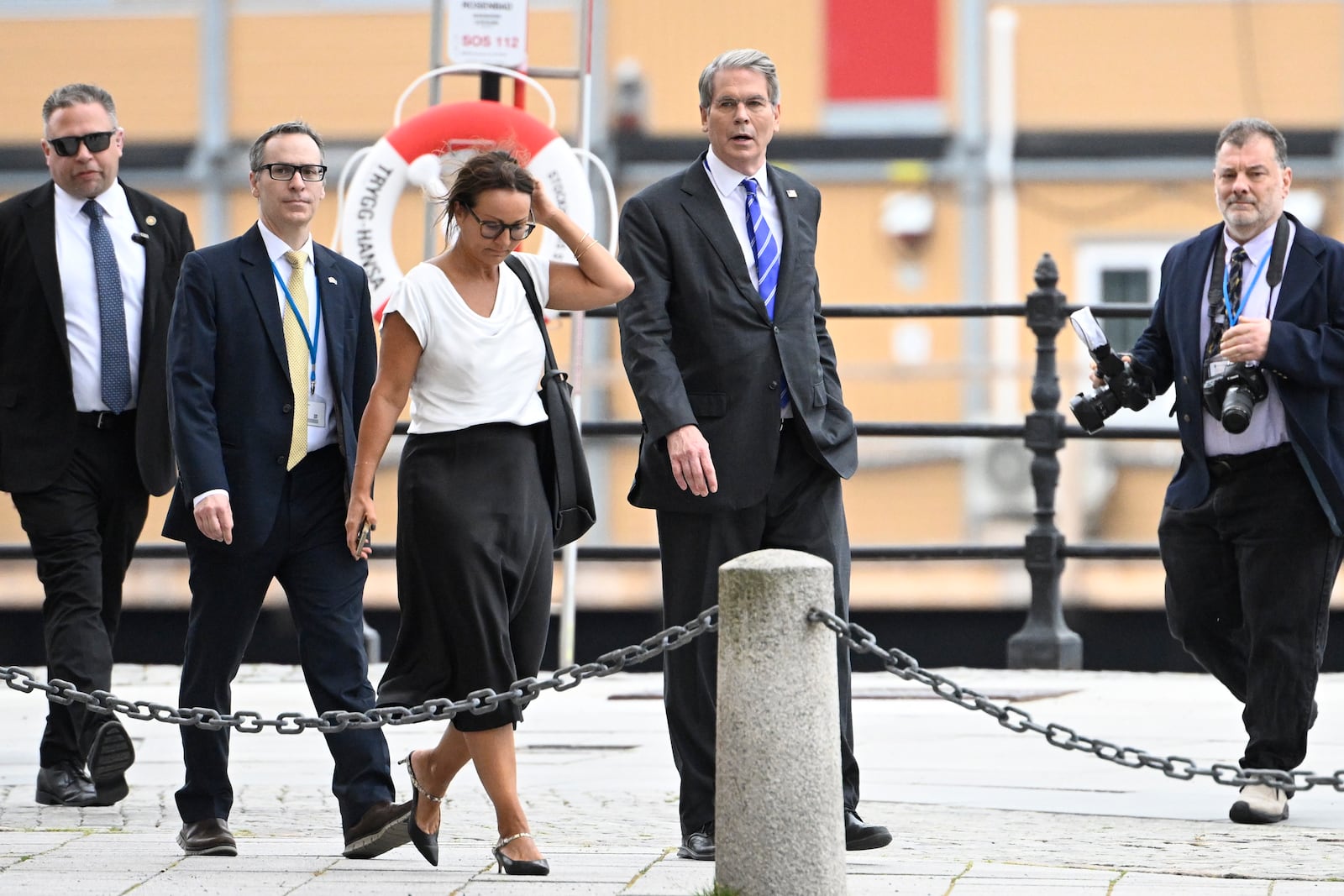 U.S. treasury secretary Scott Bessent, second from right, walks outside Rosenbad ahead of trade talks between the U.S. and China in Stockholm, Sweden, Tuesday July 29, 2025. (Fredrik Sandberg/TT News Agency via AP)