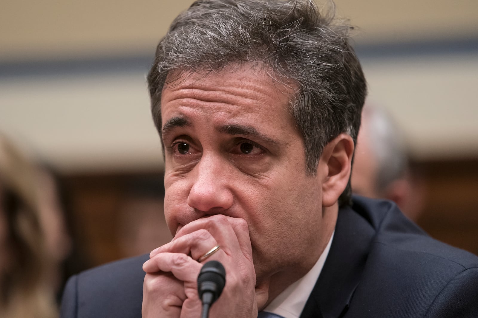 FILE - Michael Cohen, President Donald Trump's former personal lawyer, becomes emotional as he finishes a day of testimony to the House Oversight and Reform Committee, on Capitol Hill in Washington, Feb. 27, 2019. (AP Photo/J. Scott Applewhite, File)