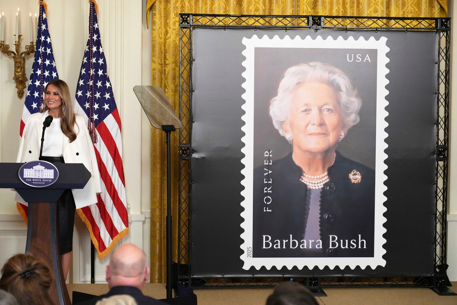 First lady Melania Trump speaks during the unveiling of a U.S. Postal Service Stamp honoring former first lady Barbara Bush, Thursday, May 8, 2025, in the East Room of the White House in Washington. (AP Photo/Jacquelyn Martin)